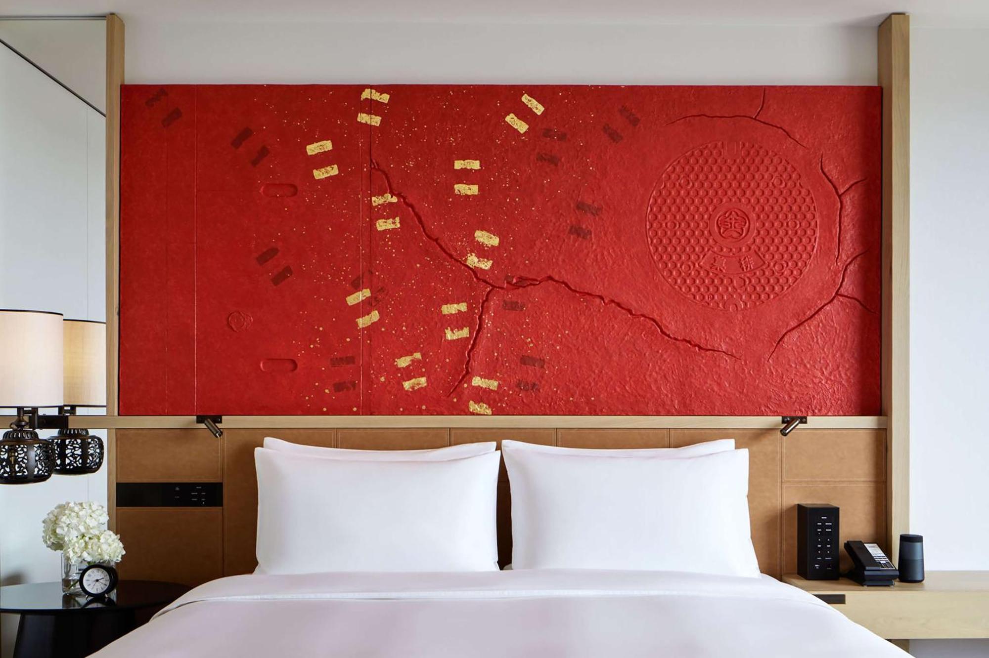 Hyatt Centric Канандзава Экстерьер фото A bed with a headboard